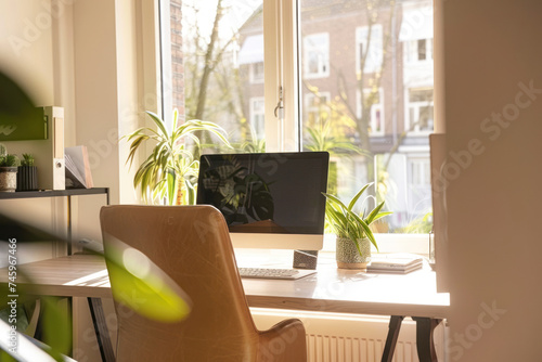 Stylish home office interior with a sleek desk, ergonomic chair. © Hunman