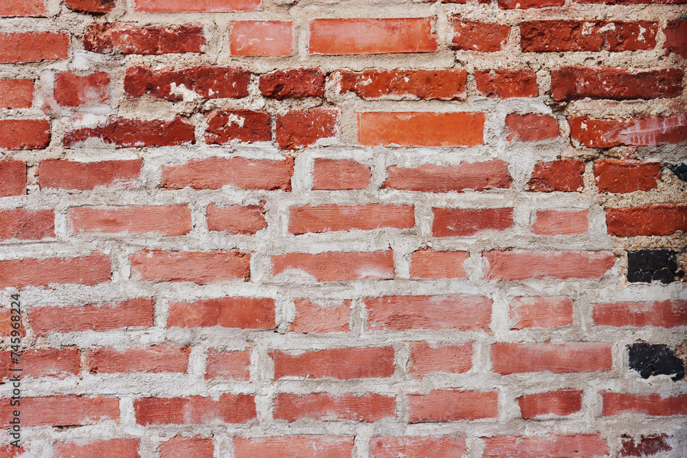 Naklejka premium Red brown old brick wall background grunge texture.