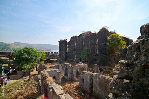 Ruins of Murud Janjira fort , an ancient naval fortress constructed in 1567 AD on a clear day situated in Raigad district of Maharashtra, India, Asia. photo