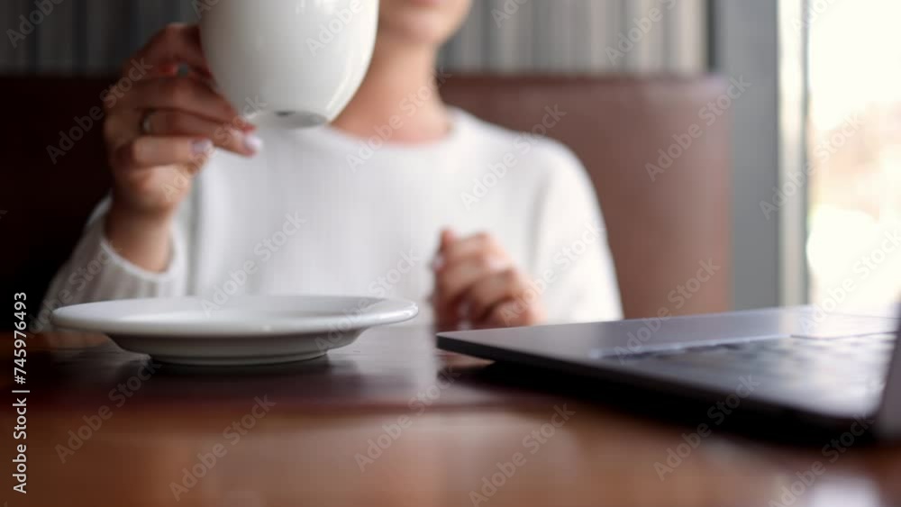 Close-up of hands of unrecognizable businesswoman typing on laptop keyboard while working online. The concept of remote work online, freelancing and successful business. Close-up of hands of unrecognizable businesswoman typing on laptop keyboard while working online. The concept of remote work online, freelancing and successful business.