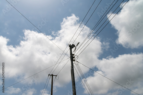 View of the electric pole with the cables