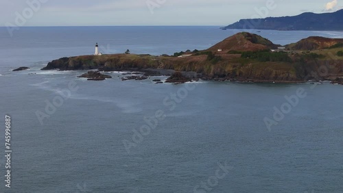 Yaquina Head Lighthouse- Cape Foulweather. Crane down shot Video Pacific Northwest
 photo