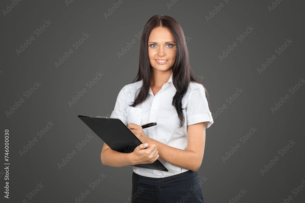 Young business female smiling in the studio Young business female smiling in the studio