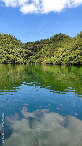 Greenish water in lagoon. Tiktikan Lagoon. Bucas Grande, Surigao del Norte. Philippines. Vertical view. photo