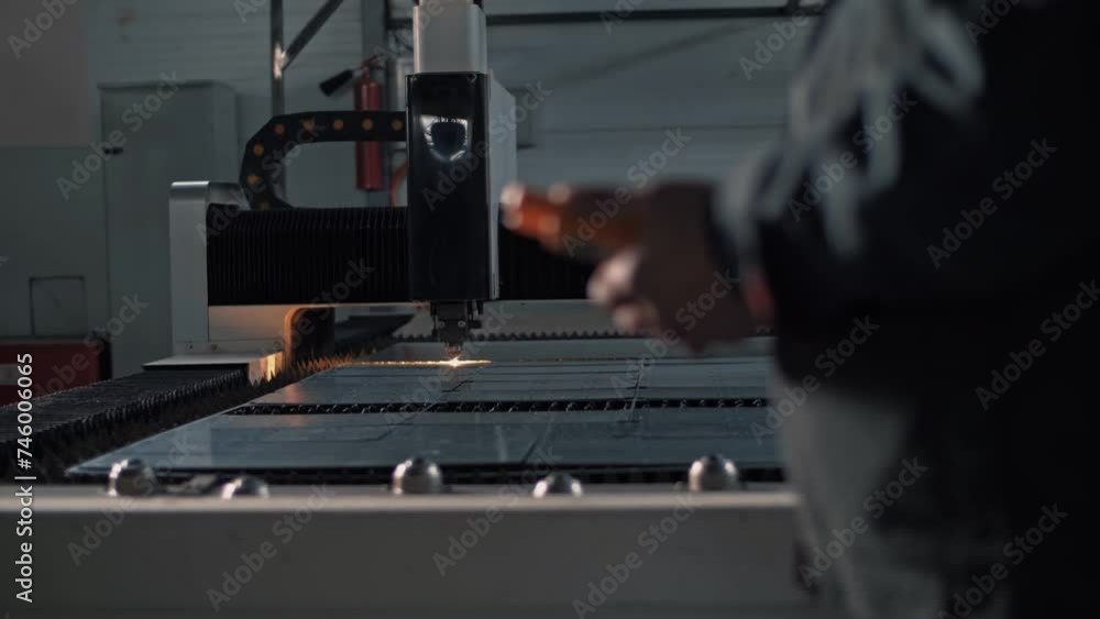 Controlling a CNC laser cutting machine by control