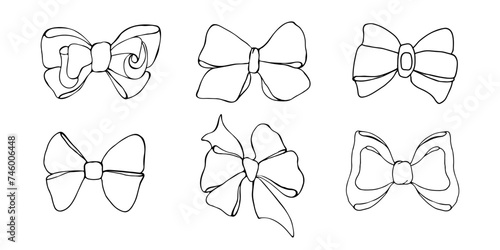 Set of black bowknots. Hand drawn bow illustration isolated on white background.