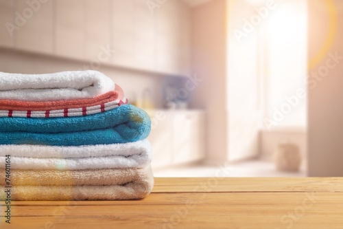 Stack of clean fresh aroma laundry in bathroom