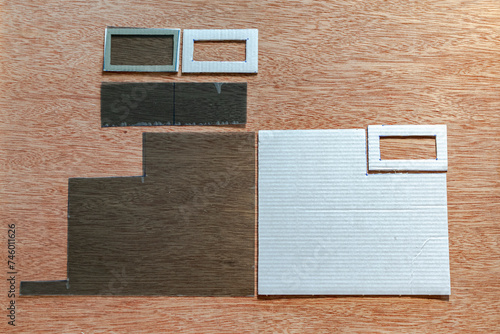 Wallpaper Mural A cardboard paper and a polarization filter sheet traced with a felt-tip pen and cut into rectangles hollowed out to make a DIY photographic cross-polarization filter for use on flash units and lenses Torontodigital.ca