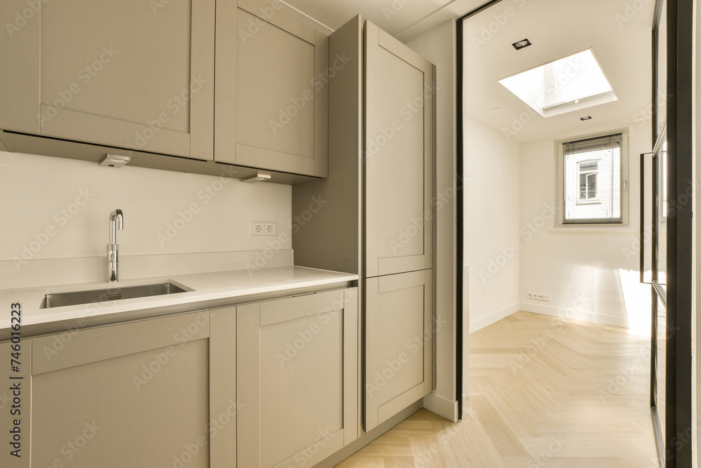 Modern kitchen design with clean lines and neutral colors Modern kitchen design with clean lines and neutral colors