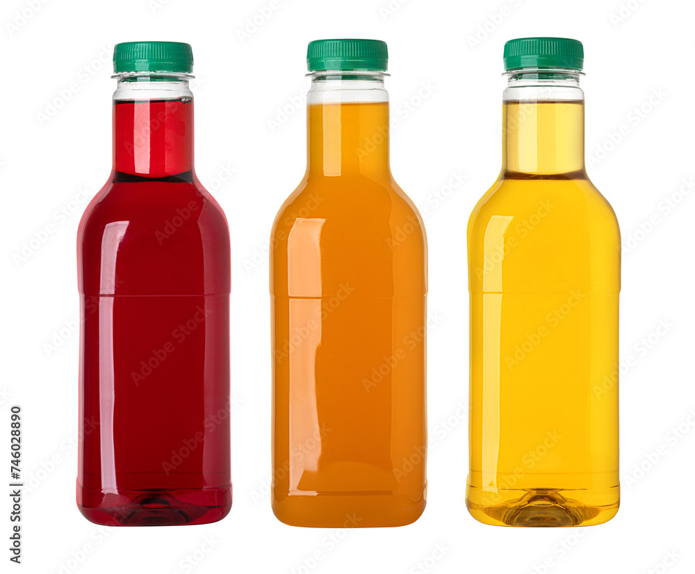 Plastic bottles of juice with green lid Plastic bottles of juice with green lid