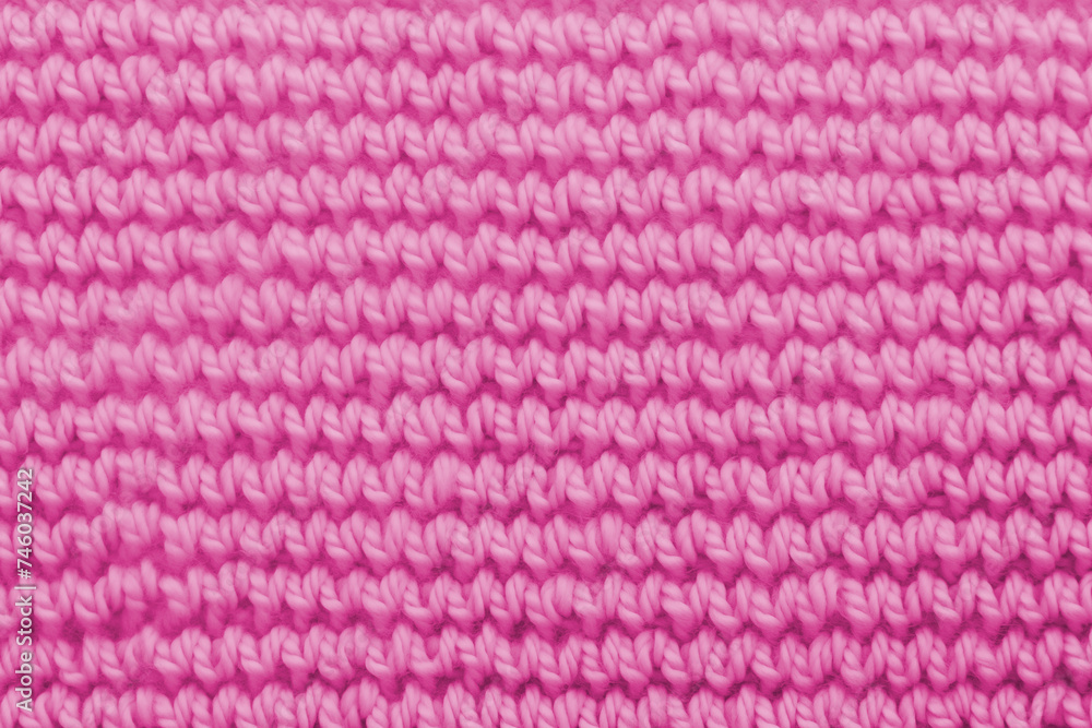 Pink knitted texture. Abstract background