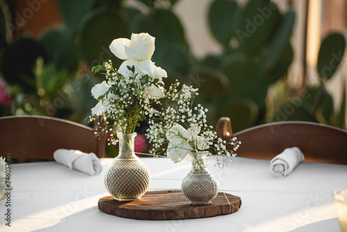 A centerpiece is a central decorative object, often flowers, candles or fruit, and is an important part of the wedding reception decoration.