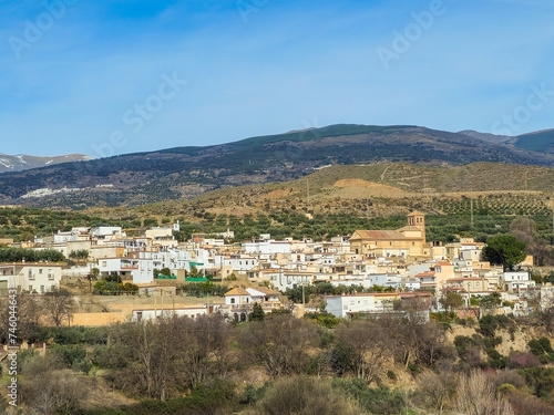 View of Cherin (Ugijar) with Sierra Nevada in the background in the Alpujarra of Granada photo