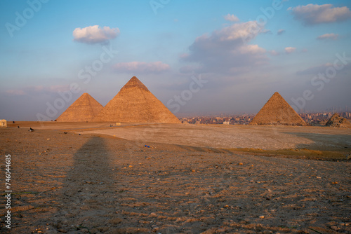 Pyramids of Giza  pyramid complex consist of three pyramids  Menkaure  Khafre or Chephren  and the Great Pyramid of Giza  the largest Egyptian pyramid served as the tomb of Pharaoh Khufu  Giza  Egypt