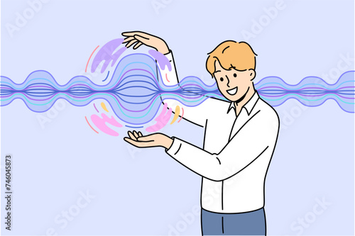 Man stands near energy wave, demonstrating results scientific experiments on physical phenomena. Business guy touches energy wave that allows you to quickly transmit commercially important information