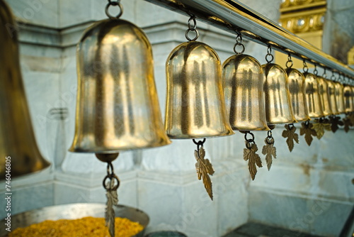 Bells hanging in a temple in Bangkok