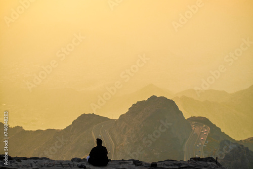 Golden Hour gleams as sun goes down at Taif mountain photo