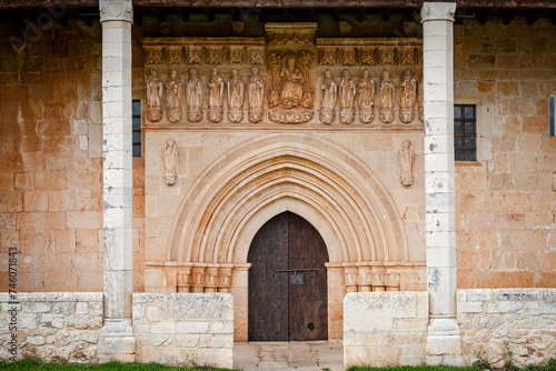 Gothic sculptural frieze  Christ in majesty surrounded by the Tetramorphs and flanked by the twelve apostles   Pis  n de Castrej  n  Palencia  Spain