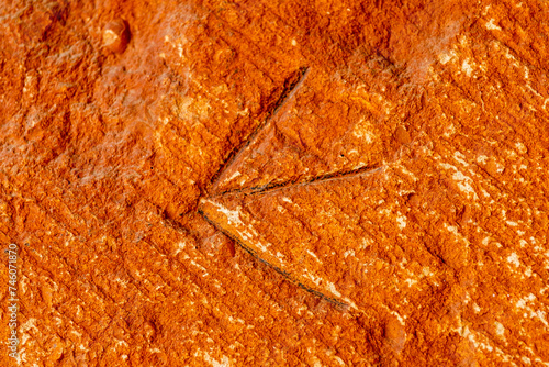 stonemason mark, Parish Romanesque temple dedicated to the Assumption of the Virgin, Pisón de Castrejón, Palencia, Spain photo