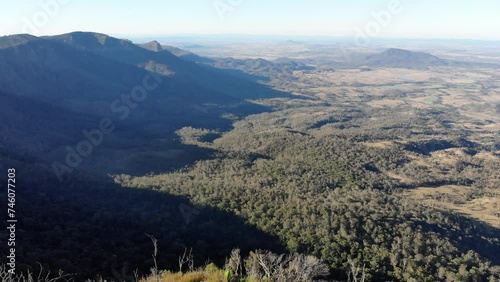 aerial panorama of scenic mountains in main range national park, south east queensland, australia; sunset over bare rock, mount cordeaux, mount mitchell photo