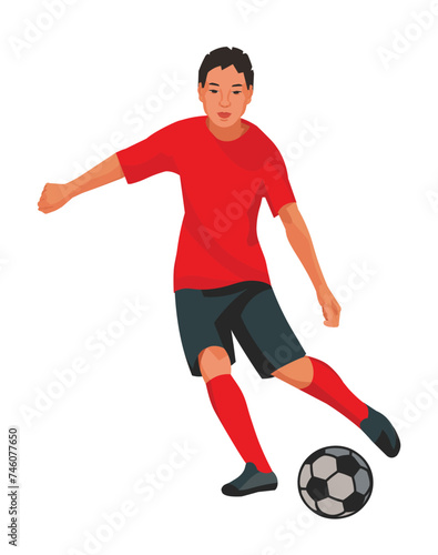 Mongolian teenager playing football in red uniform dribbling the ball on the field and going to kick a ball on a white background