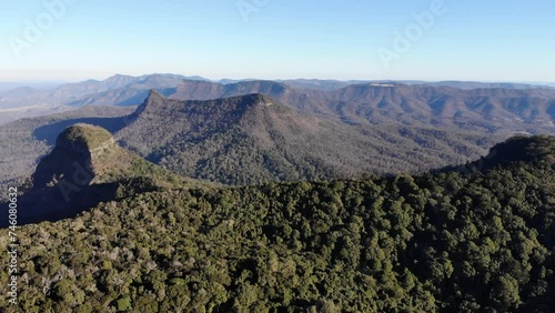 aerial panorama of scenic mountains in main range national park, south east queensland, australia; sunset over bare rock, mount cordeaux, mount mitchell photo