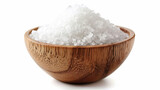 White sea salt placed in a wooden plate against a white isolated background