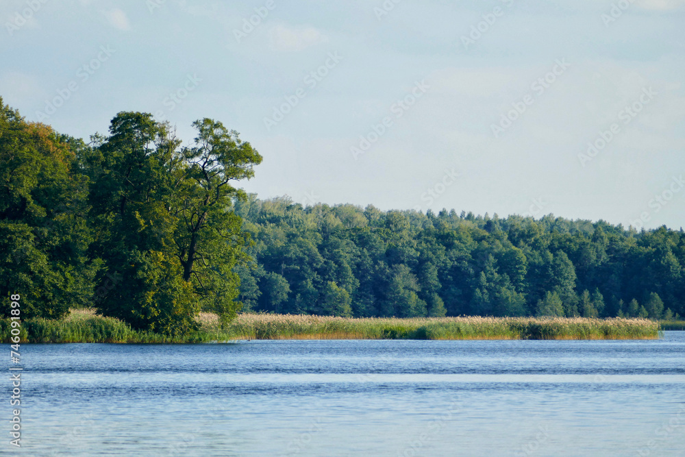 Scenic view of rural landscape in Masuria, Poland Scenic view of rural landscape in Masuria, Poland