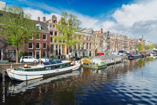 embankment of Amstel canal in Amsterdam at summer day  Netherlands