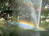Rainbow over the lake water surface in the park in Icarai, Niteroi, Rio de Janeiro, Brazil