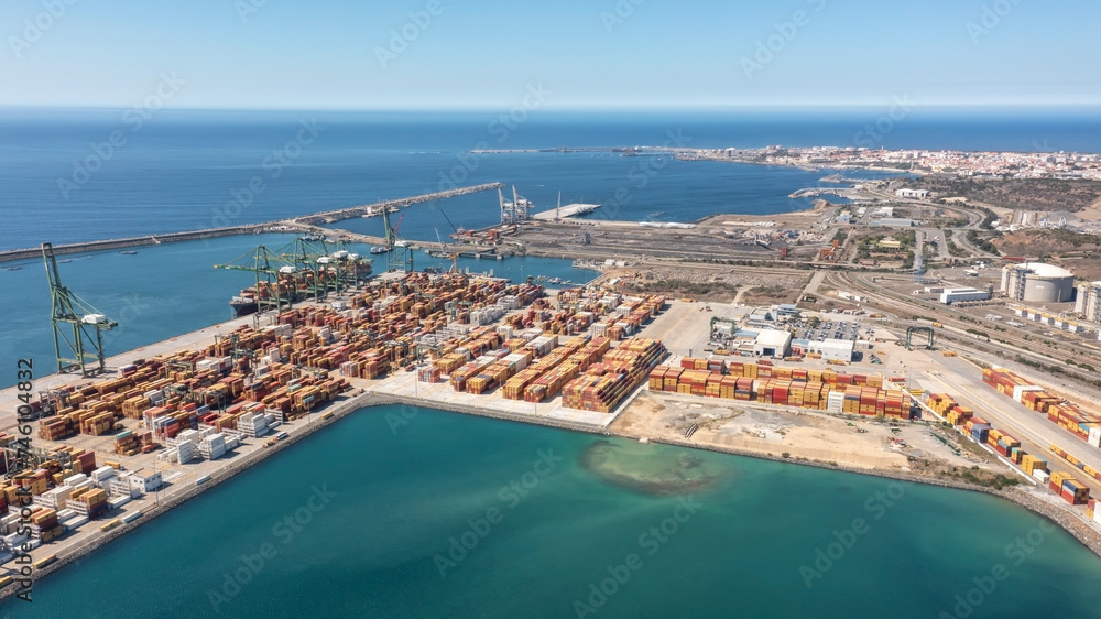 Aerial view of container cargo terminal of commercial port, business logistics and transport industry in Sines Setubal, Portugal.