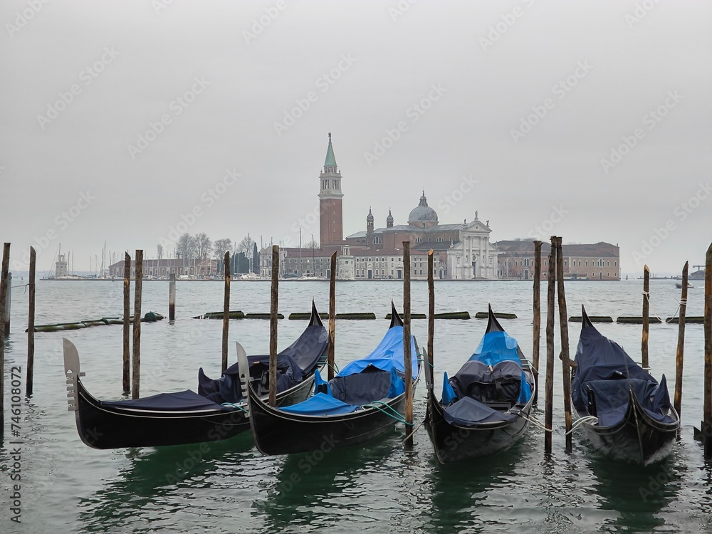 Venice island of St. Giorgio Maggiore with gondolas