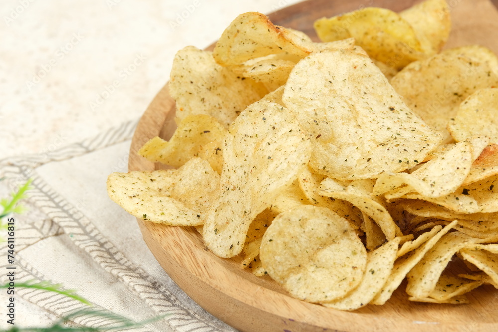 Potato Chips Served on a Plate on White Background Potato Chips Served on a Plate on White Background