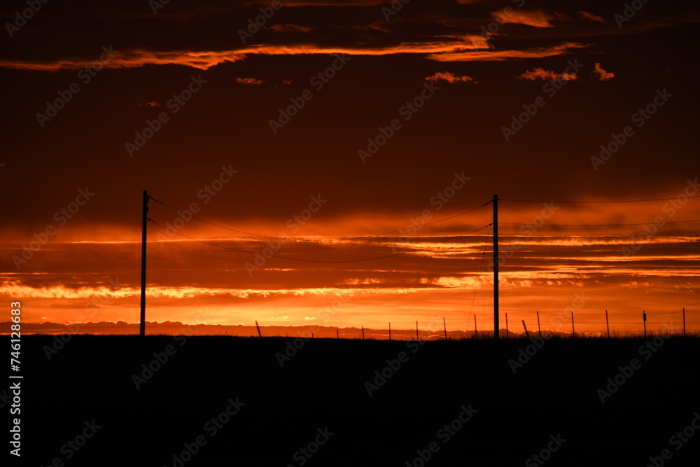 Obraz premium wind turbines at sunset