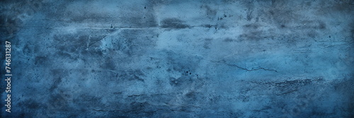 Blue grunge background with scratches. Dirty navy cement textured wall. Vintage wide long backdrop use for design web banner with scratches and cracks. Old stained dark concrete  distressed texture