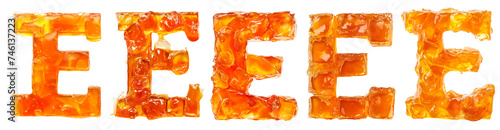 The letter "E" is made from marmalade or orange jam. Sweet alphabet, orange letter.