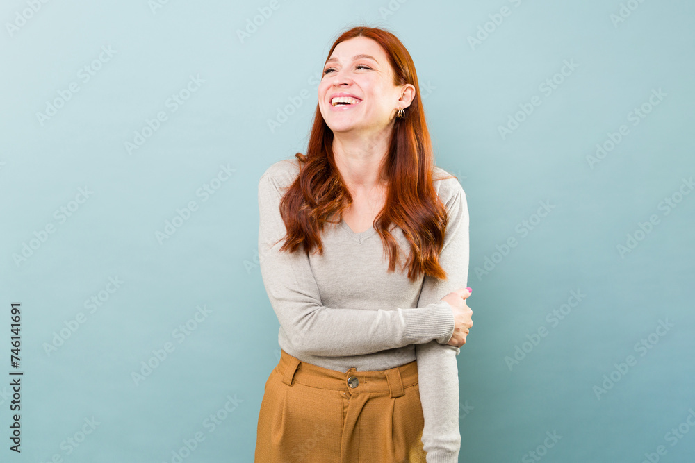 Beautiful redhead woman having fun and laughing Beautiful redhead woman having fun and laughing