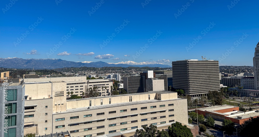 Los Angeles skyline, City Hall, snowy mountains in the background Los Angeles skyline, City Hall, snowy mountains in the background