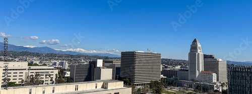 Los Angeles skyline, City Hall, snowy mountains in the background