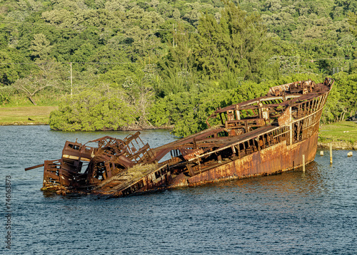 Old Rusty Shipwreck near Dock in Roatan Honduras