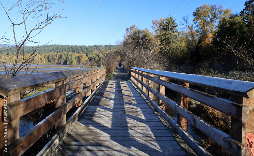 Early morning frost on wooden bridge railings Early morning frost on wooden bridge railings
