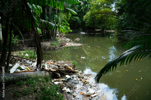 Environmental crime, garbage carelessly thrown into the nature. In the Central Park Mindu of Manaus, the city administration no longer can manage the cleanup of the public grounds. Manaus, Brazil. photo