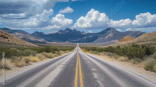 Mountainous Road Journey Through Summer Landscape with Winding Highway, Empty and Scenic, Surrounded by Nature, Clouds, and Hills