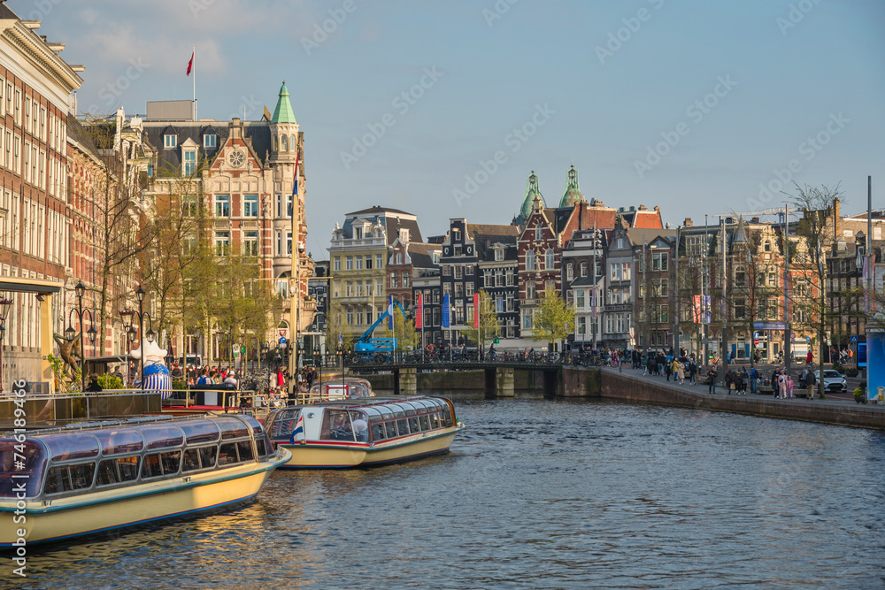 Amsterdam Netherlands, city skyline at canal waterfront