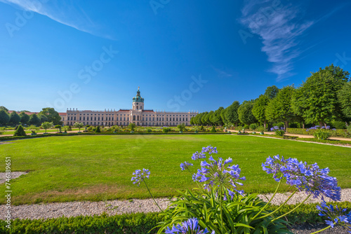 Berlin, Germany - July 19, 2022 : back side at Charlottenburg Palace (Schloss) the Baroque summer palace with garden
