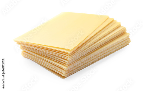 Stack of uncooked lasagna sheets isolated on white