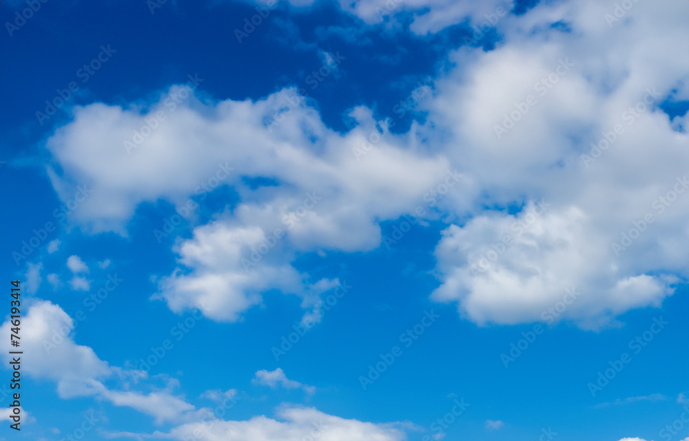 Blue Sky and White Clouds in a Beautiful Summer Day Blue Sky and White Clouds in a Beautiful Summer Day