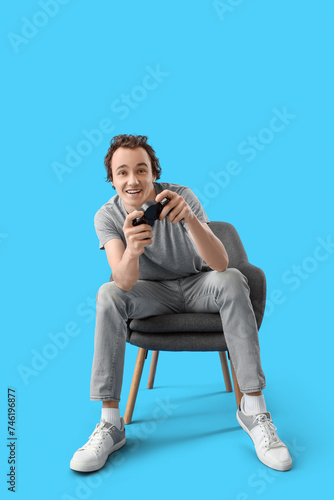 Young man playing video gam...