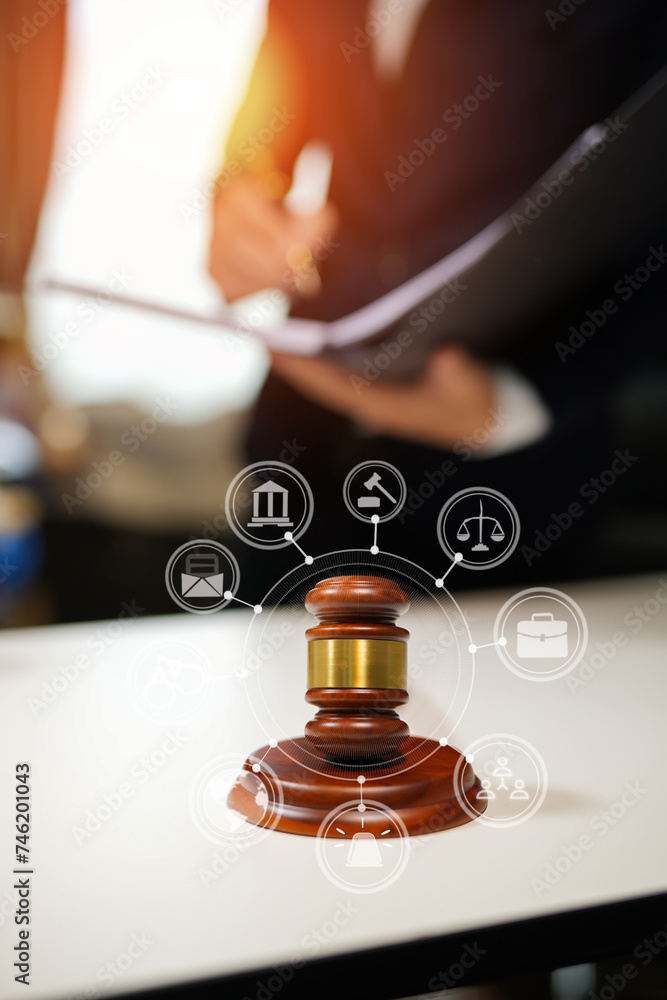 judge on wooden table And experienced lawyers meet with clients and give advice behind the scenes. legal services legal consulting concept judge on wooden table And experienced lawyers meet with clients and give advice behind the scenes. legal services legal consulting concept