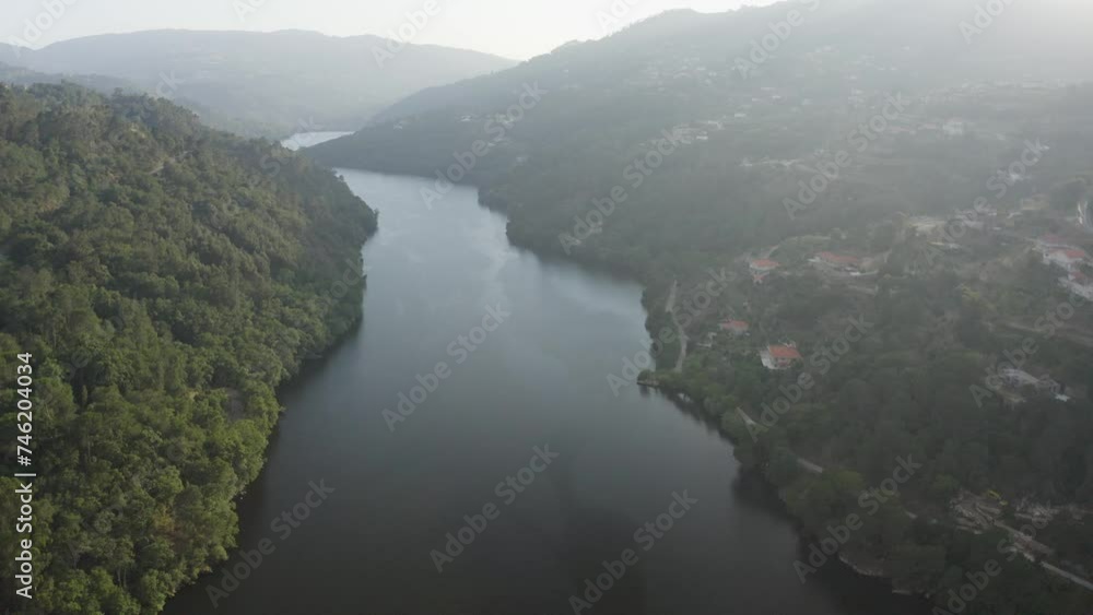 aerial view moving over Douro river and Mazouco village in northern Portugal. View from Colado viewpoint. Tourist attraction. Place to visit